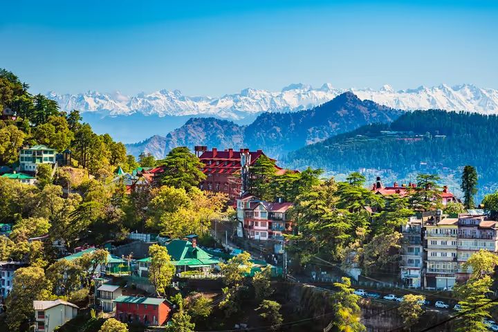 Beautiful hill town of Shimla with colonial buildings, pine forests, and snow-covered Himalayan peaks, among the best places to visit in April in India – Towno